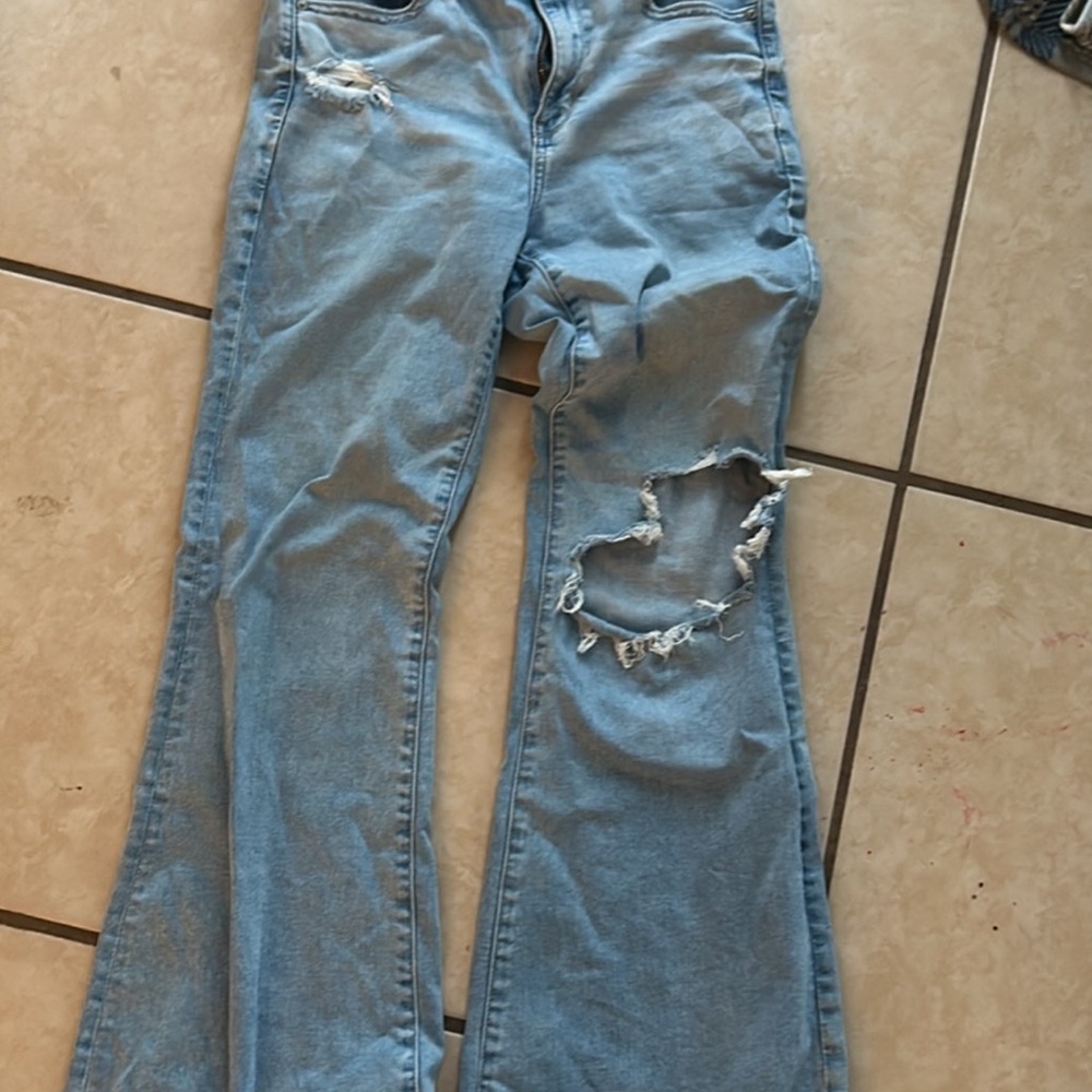 Women's Light Blue Distressed Bell Bottom Jeans